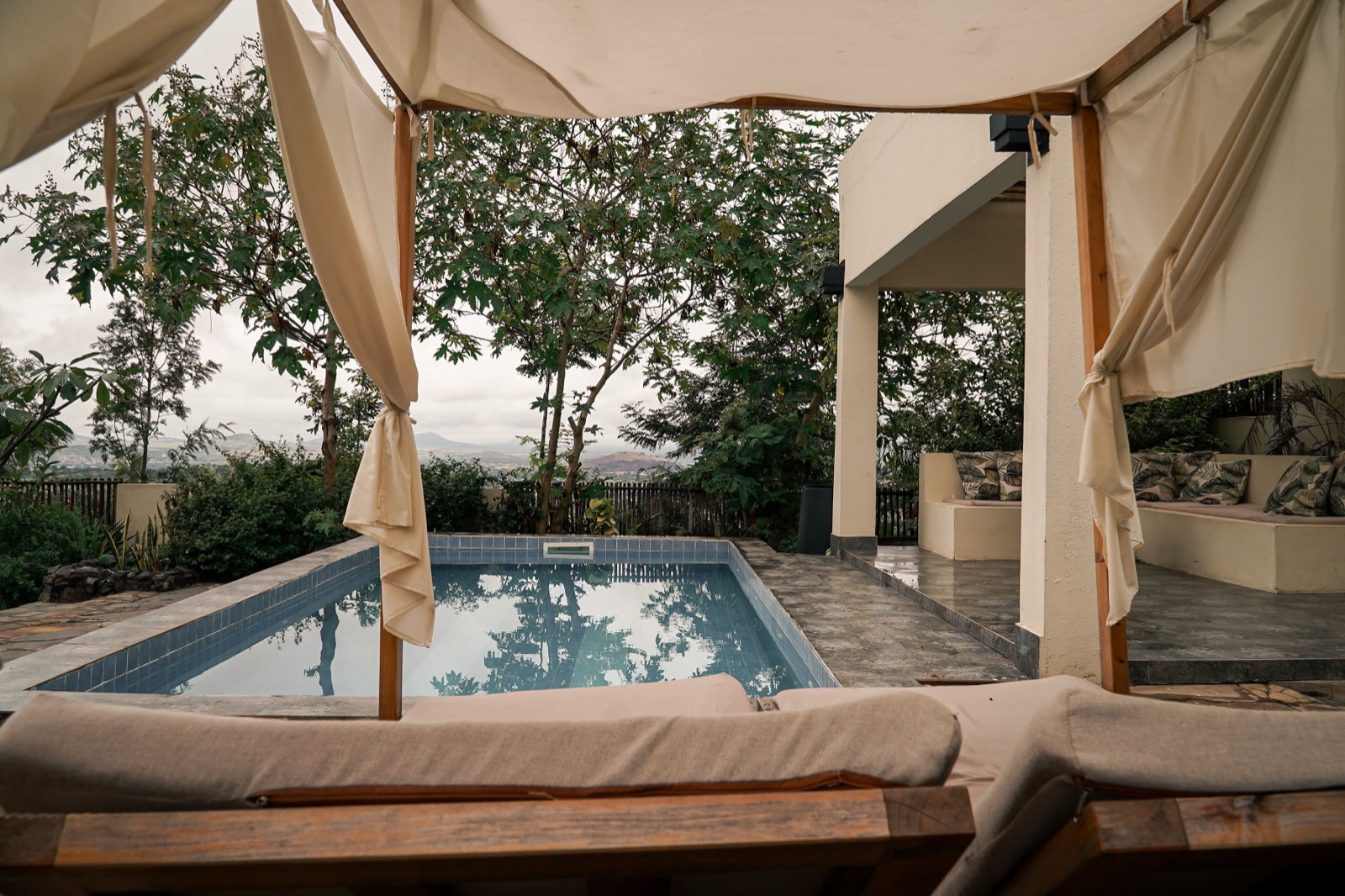 Pool and shaded daybed overlooking the valley