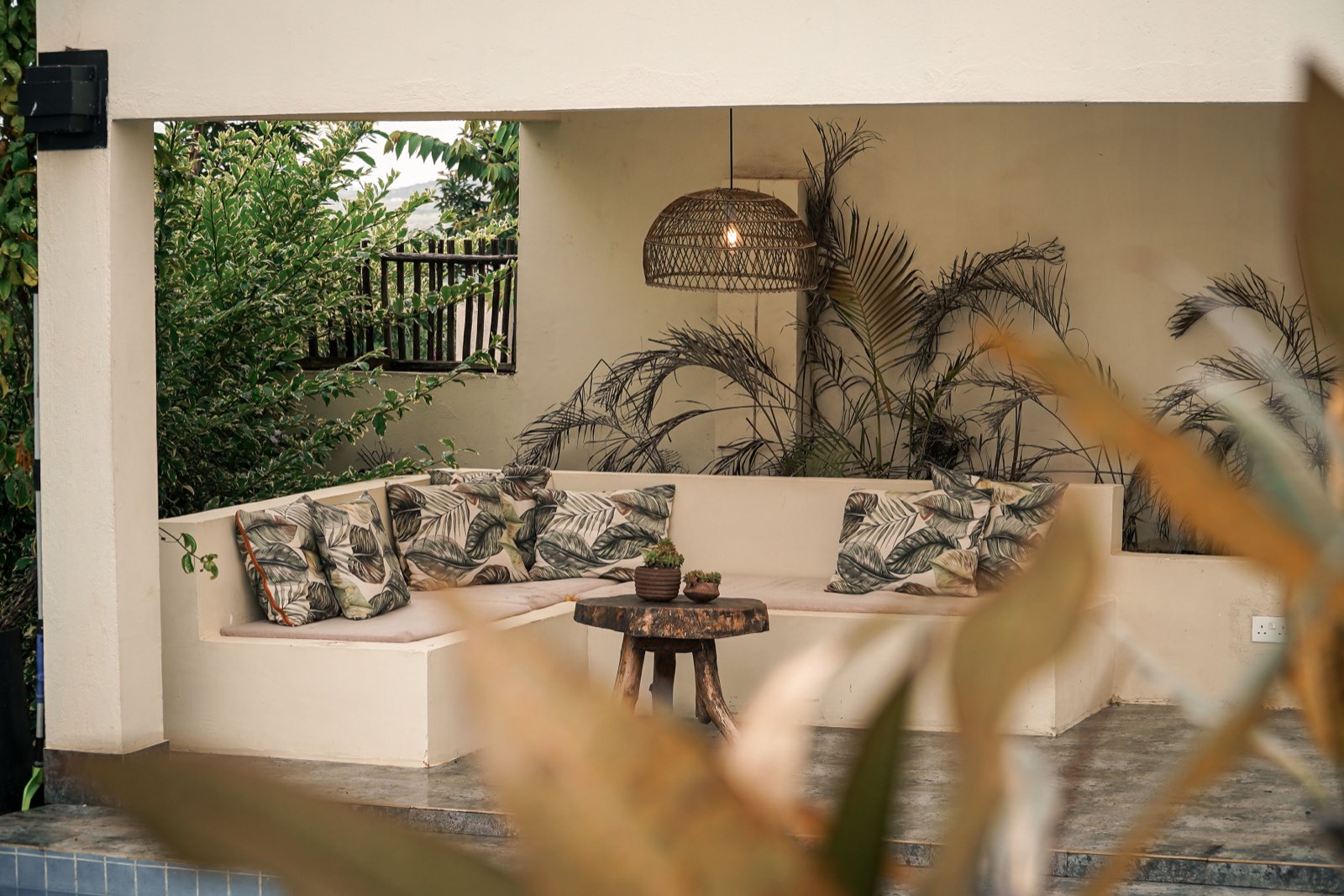 Shaded seating beside the pool